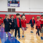 Students enjoy a warm-up walk during P.E.