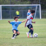 Middle School soccer player during a game.